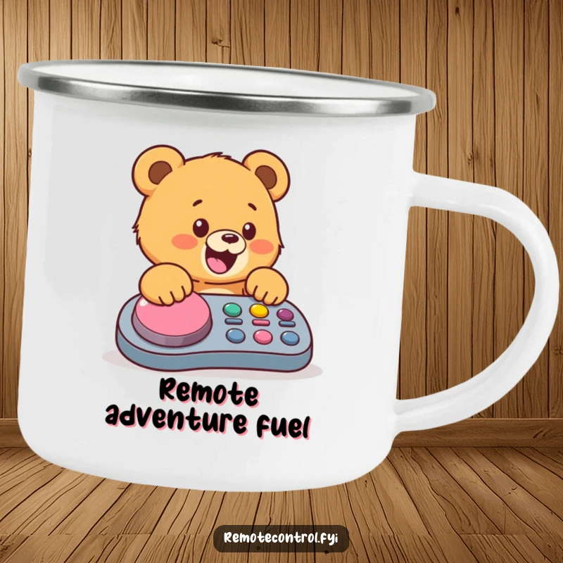 Funny bear cub camping mug, showing a joyful cub mashing a giant button on a remote, perfect for outdoor enthusiasts.