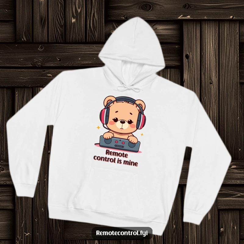 Funny hoodie featuring a bear in headphones, captivated by a remote, symbolizing a hilarious obsession with entertainment and relaxation.