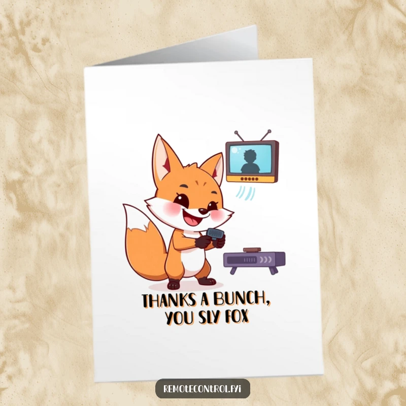 Funny Free Printable Thank You Card: Mischievous fox with a wide grin holding a remote control. Humorous downloadable art.