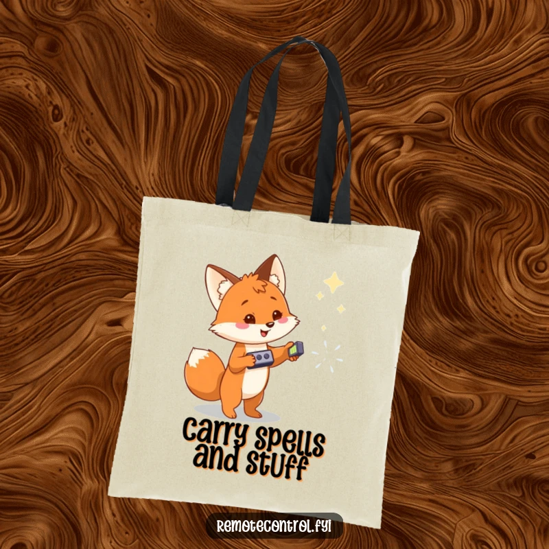 Funny tote bag with a cheerful fox holding a remote, pointing at a distant magical object, showcasing adventurous style.