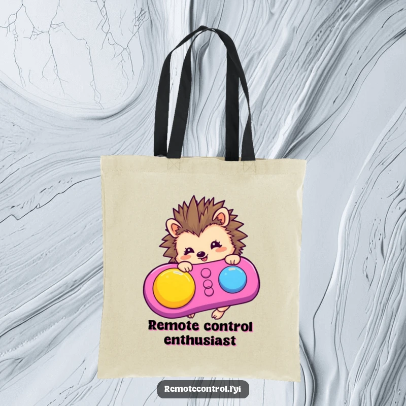 Funny hedgehog character focused on pressing a button on a colorful remote control, illustrated on a handy tote bag.