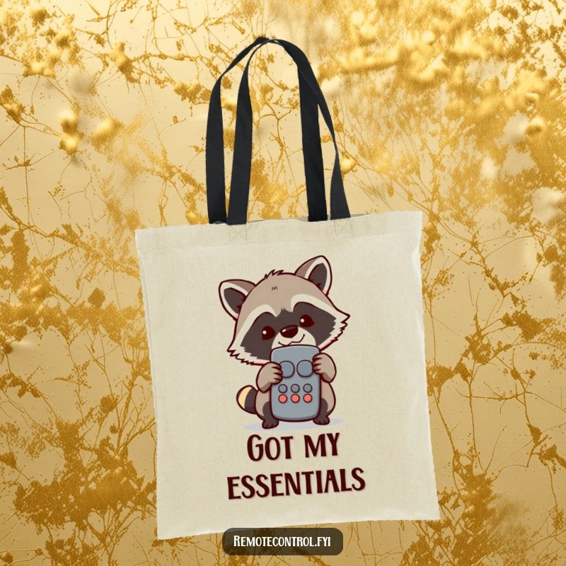 Funny Raccoon Tote Bag: Mischievous raccoon peeking from behind a television remote with a sly grin, indicating entertainment control.