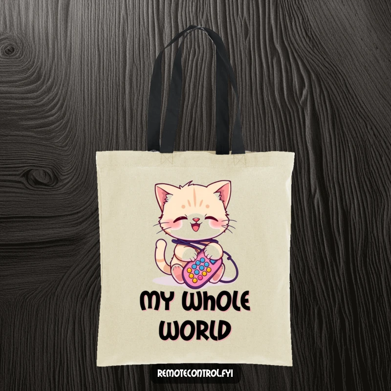 Funny kitten tote bag, a small kitten is joyfully tangled in multiple colorful remote control wires, creating a comical scene.